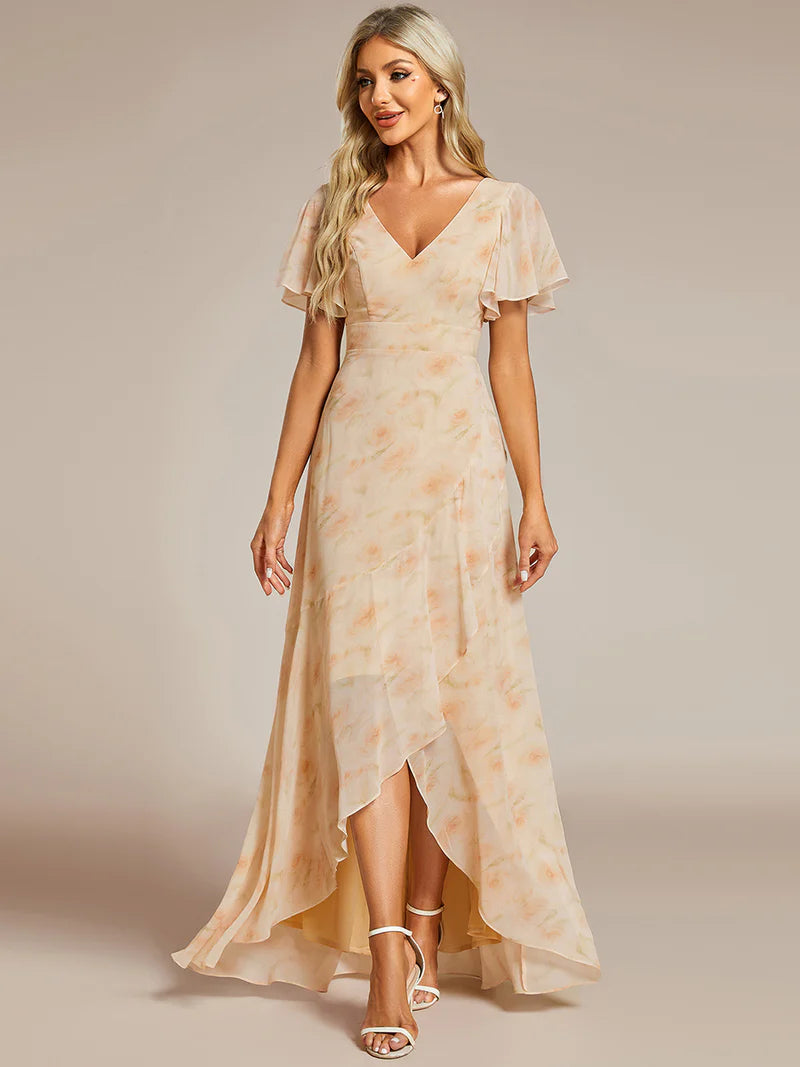 Apricot floral bridesmaid or mother of the bride dress with high low ruffle and chiffon.